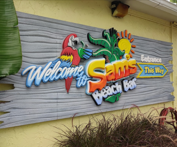 Sams Beach and Bar Sign with Parrot